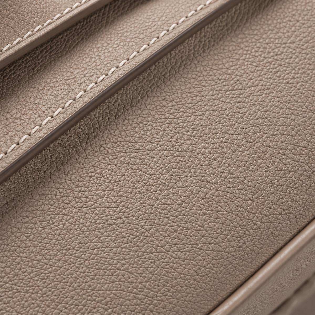 Sloane Pebbled Calfskin Top-Handle Bag in Taupe