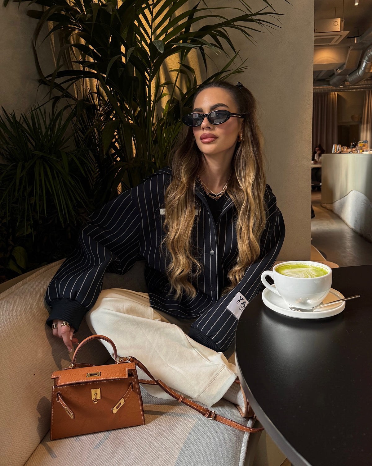 Sloane Pebbled Calfskin Top-Handle Bag in Caramel