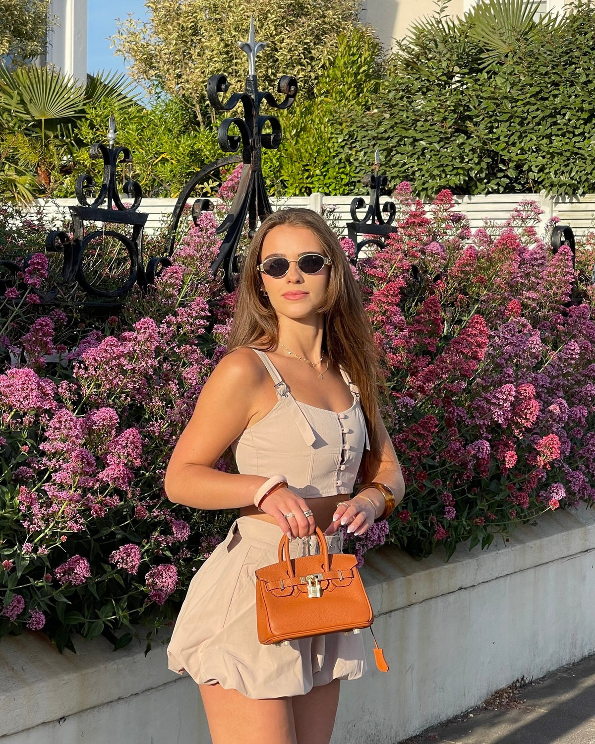 Sloane Pebbled Calfskin Top-Handle Bag in Caramel