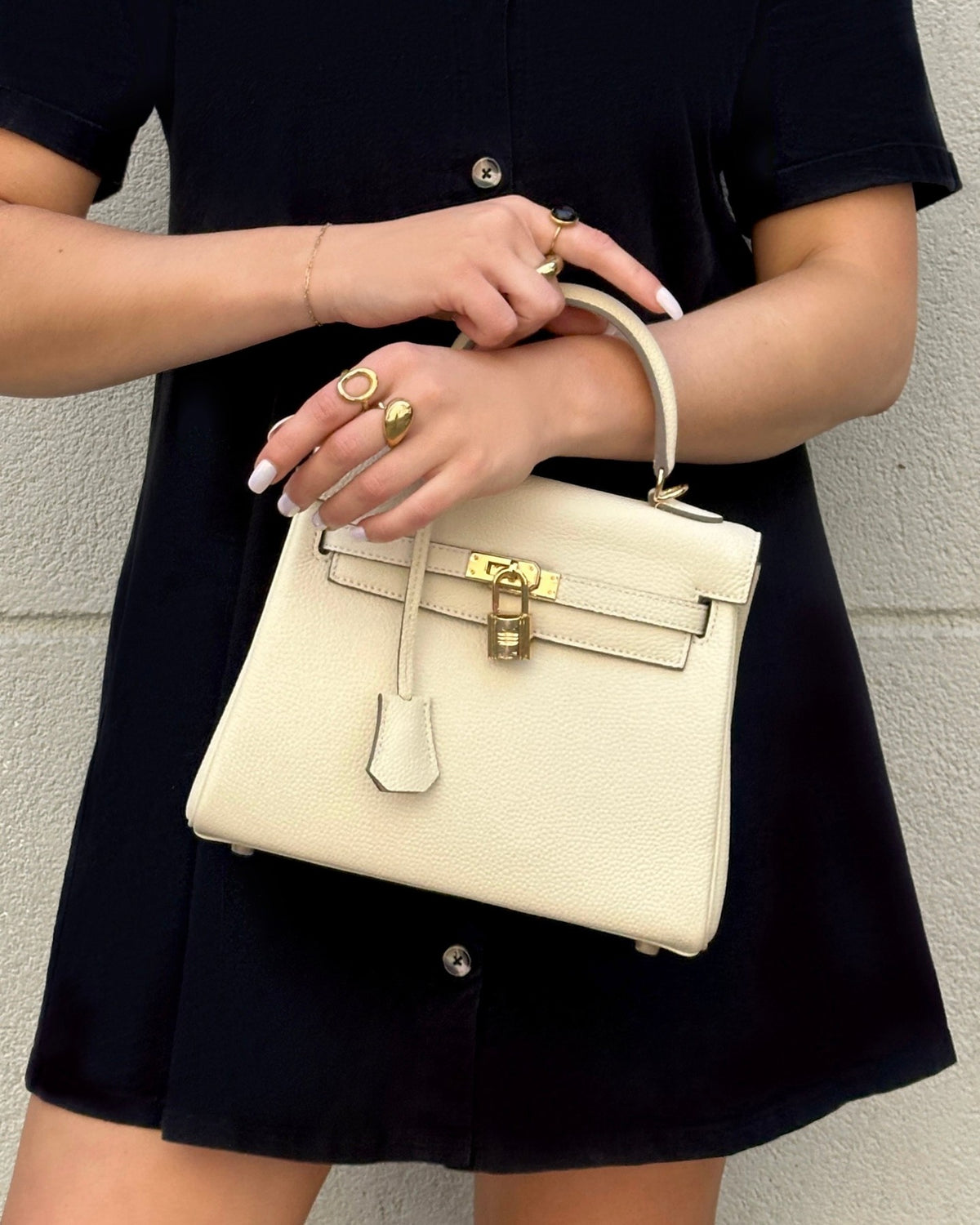Sloane Pebbled Calfskin Top-Handle Bag in Ivory