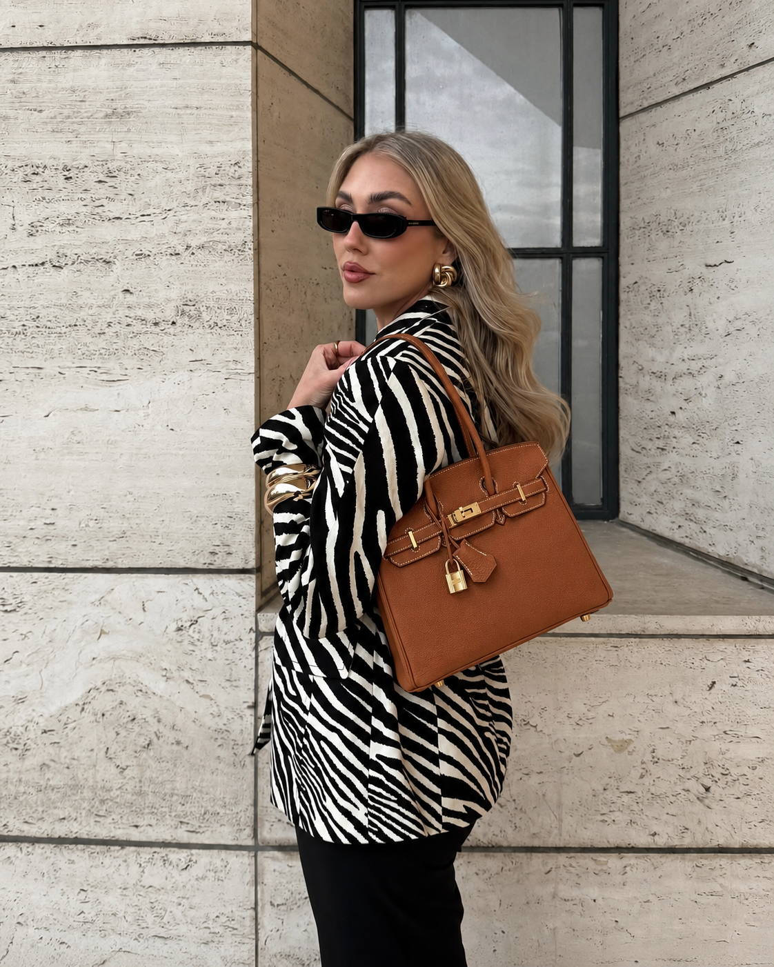 Sloane Pebbled Calfskin Top-Handle Bag in Caramel