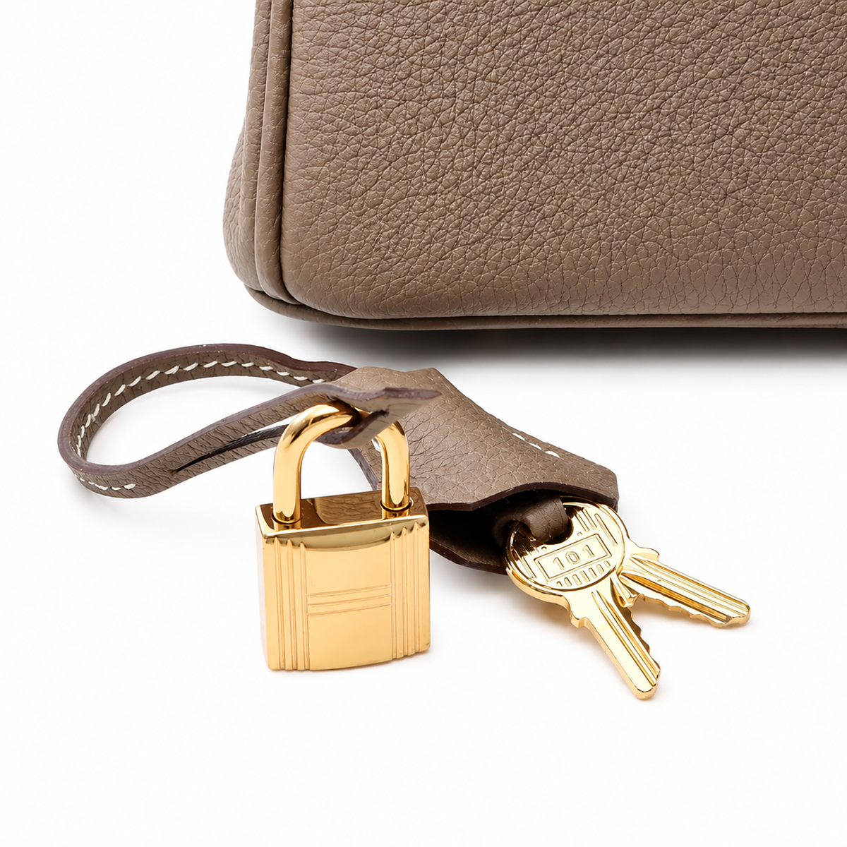 Sloane Pebbled Calfskin Top-Handle Bag in Taupe